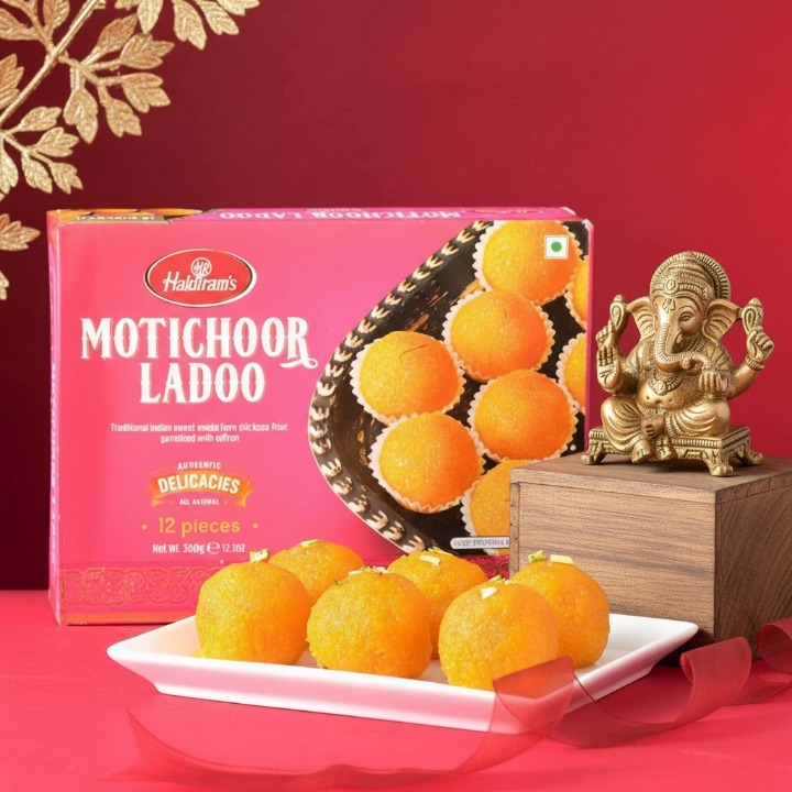 Ganesha on Chowki with Festive Laddoo